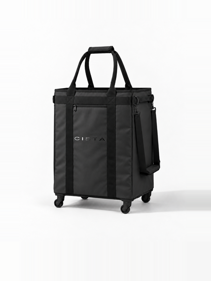 Black CISTA 120L wheeled tote in a three-quarter view, showing its front and side.